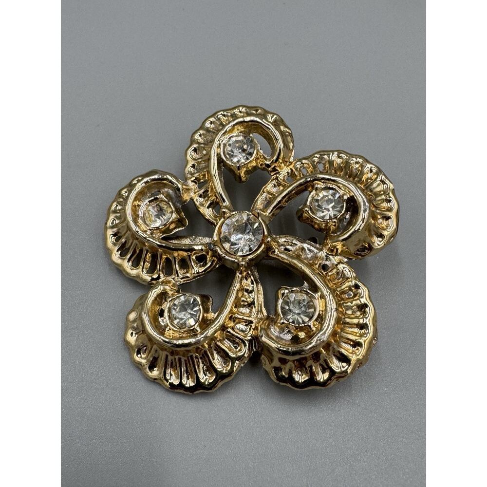 Vintageโ Gold Colored Flower Twisted Petals Clear Rhinestones Lapel Pin Brooch